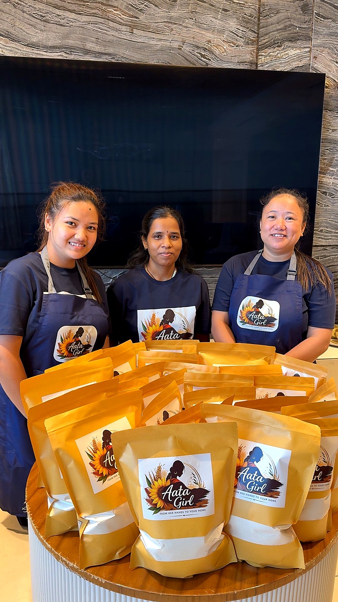 The full Aata Girl team with packed bags